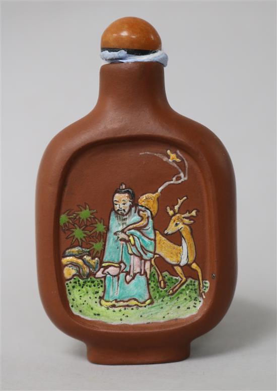 A Chinese Yixing enamelled snuff bottle, 19th century 7.5cm.